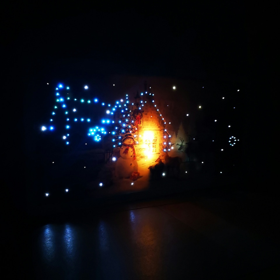 image 1 of 60 x 30cm Battery Operated Fibre Optic Touch Activated LED Christmas Wall Art with Santa Cottage Scene