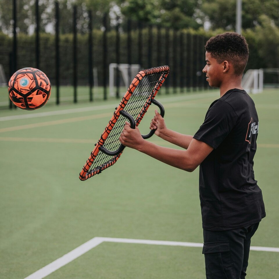 image 1 of Football Flick  Handheld Football Rebounder