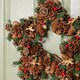 image 5 of 45cm Winter Spice Star Hanging Christmas Wreath with Pine Cones Red Berries & Dried Fruit