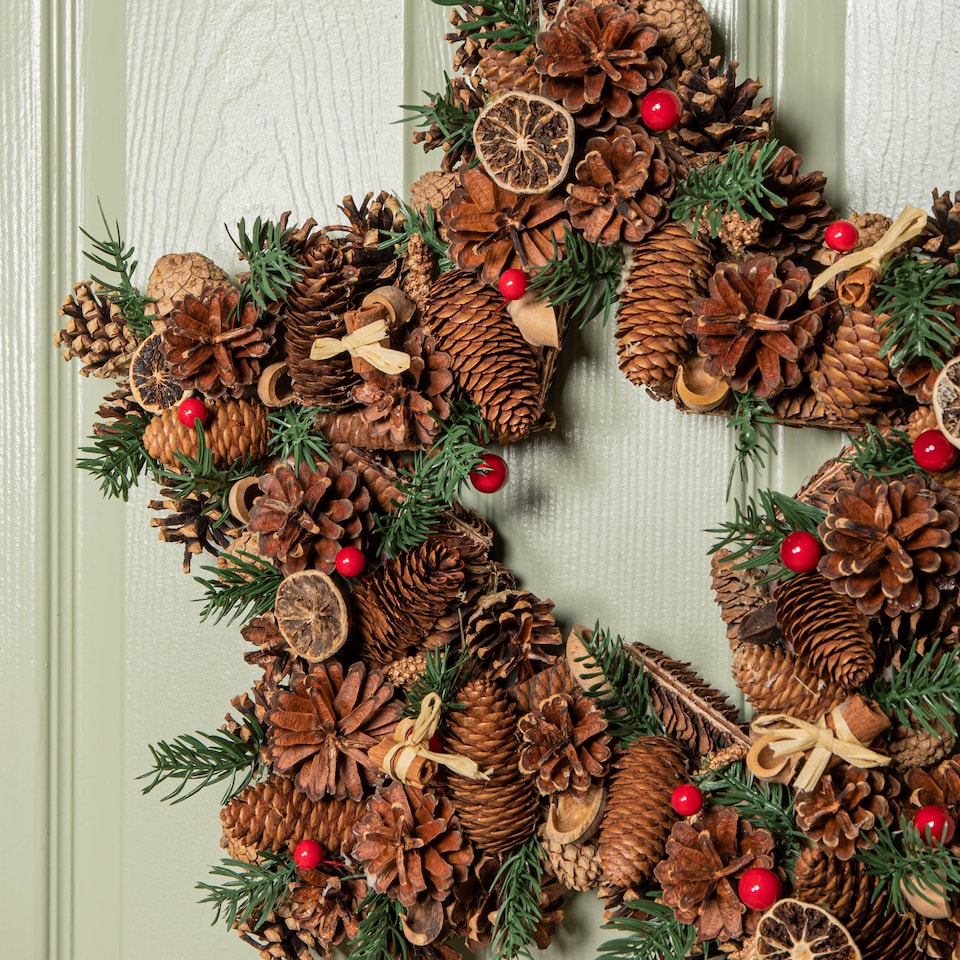 image 1 of 45cm Winter Spice Star Hanging Christmas Wreath with Pine Cones Red Berries & Dried Fruit