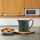 image 1 of Interiors By Premier Ceramic Milk Jug,Dark Green Milk Dispenser With Embossed Botanical Detailing,Milk Holder With Tapered Base