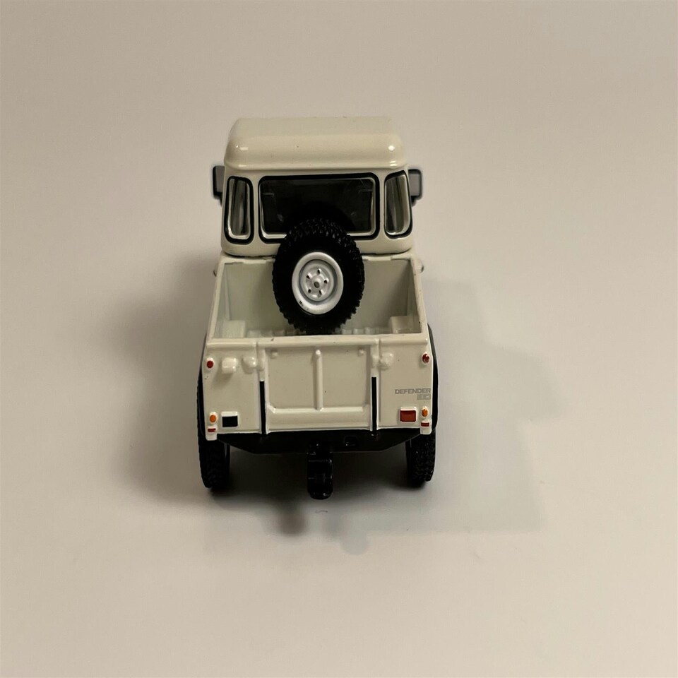 image 1 of Land Rover Defender 90 Pick Up White 1:64 Scale Mini GT MGT00338R