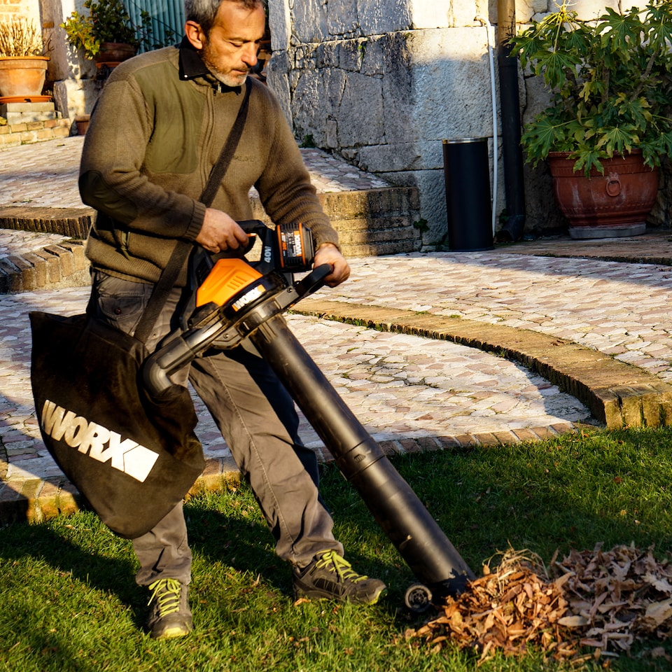 image 1 of WORX 40V cordless brushless leaf blower and vacuum with collection bag - with 2 4AH battery and charger WG583E