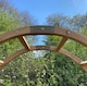 image 4 of Wooden Garden Arch (Tan) with Ground Spikes