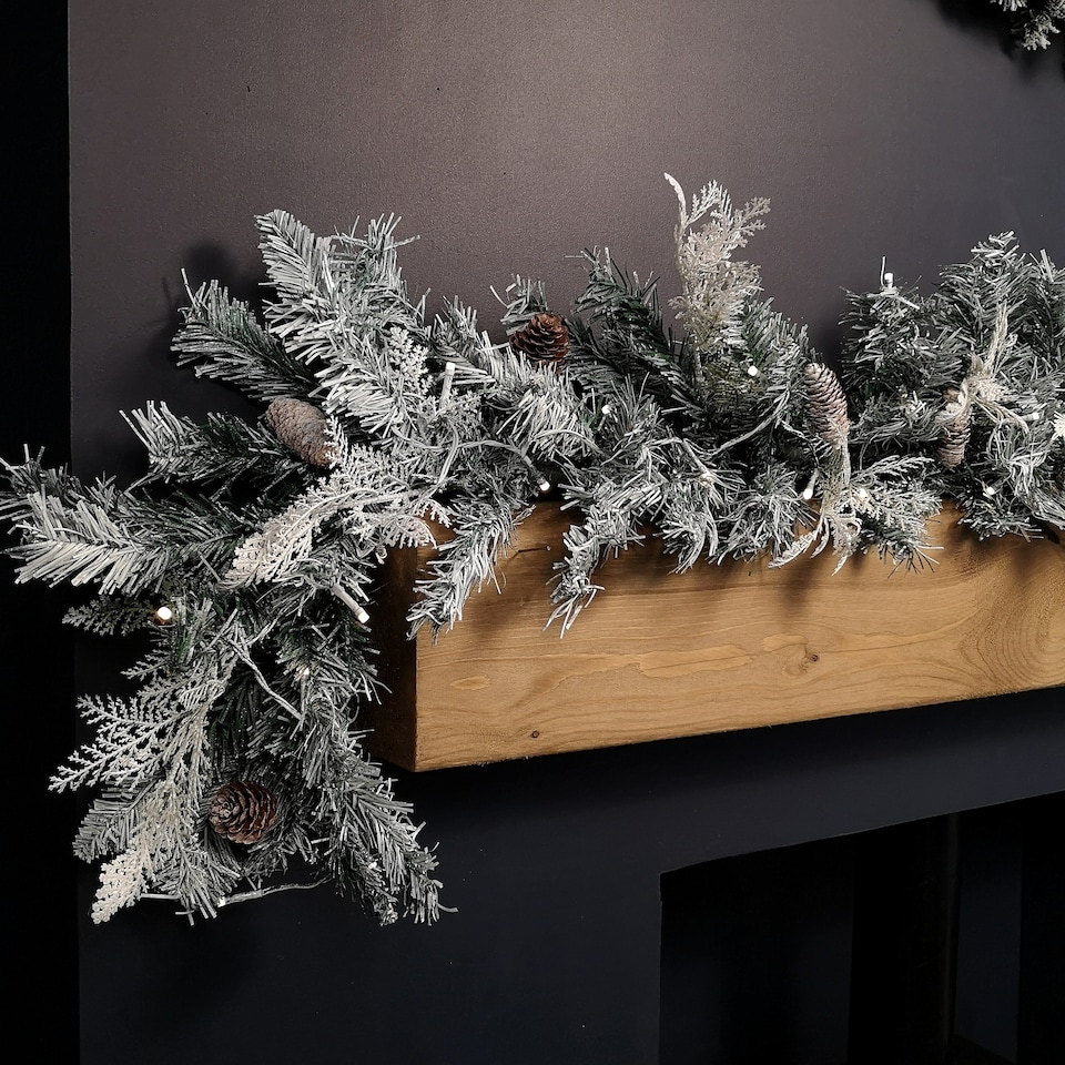 image 1 of 1.8m Snowy Christmas Garland with Pinecones 96 Tips and 50 Warm White LED Lights