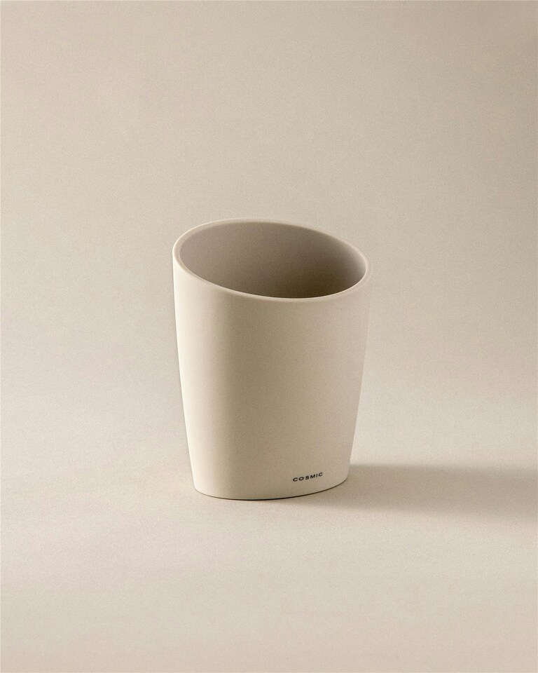 image 1 of Cosmic Toothbrush Holder Oriental Inspired Design with Soft Silver Plastic Finish