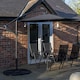 image 2 of Outdoor 4 Person Rectangular Glass Top Garden Dining Table Chairs With Black Banana Parasol and Base