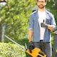 image 9 of Outsunny 20 Cordless Hedge Trimmer, 18V Electric Hedge Cutter with 51cm Dual Action Blade, 2 x 4000mAh Batteries and Brushless Motor for Garden Branches, Shrubs, Twigs, Orange