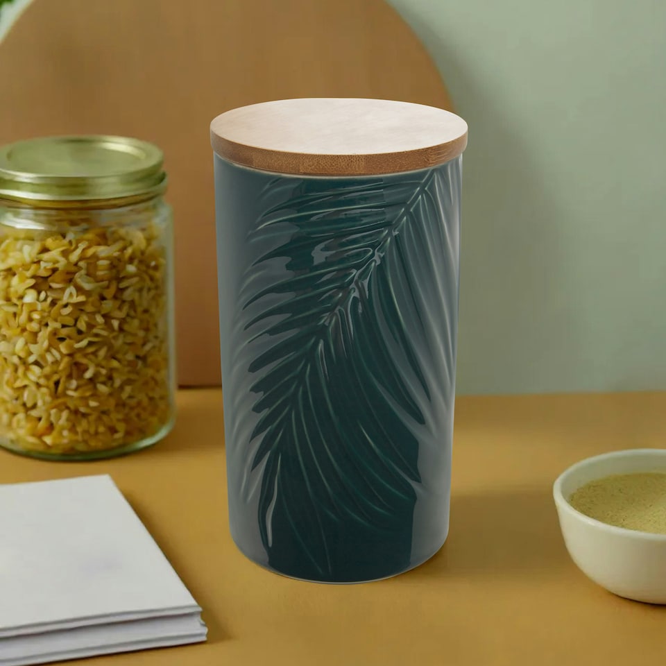 image 1 of Interiors By Premier Dark Green Large Storage Jar With Bamboo Lid,Jar With Embossed Tropical Leaf Design,Spice Storage Canister