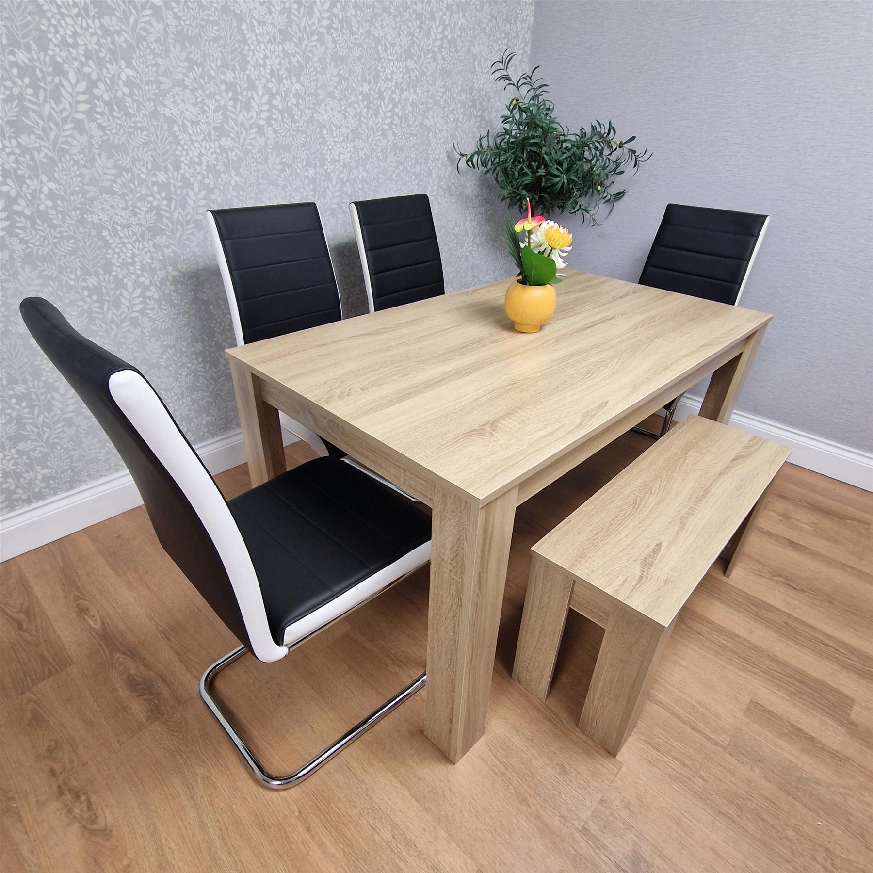 Oak Effect table and Bench with 4 Black White Stripped Faux Leather Chairs