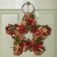 image 1 of 35cm Red Hanging Star Christmas Wreath with Red Berries and Pinecones
