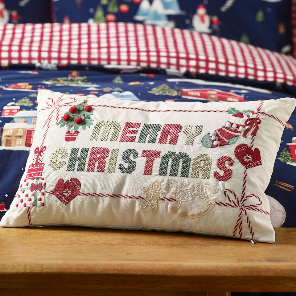 image 1 of Catherine Lansfield Merry Christmas Cross Stitch 30x50cm Cushion Natural Cream | Natural | 30 x 50 cm