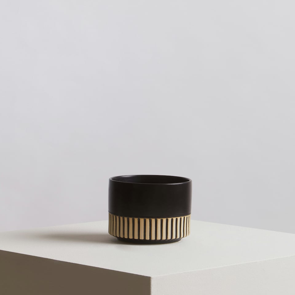 image 1 of Interiors by Premier Small Ceramic Planter, Modern Black and Gold Planter for Indoor Plants, Drum-shaped Ceramic Planter for Home Black