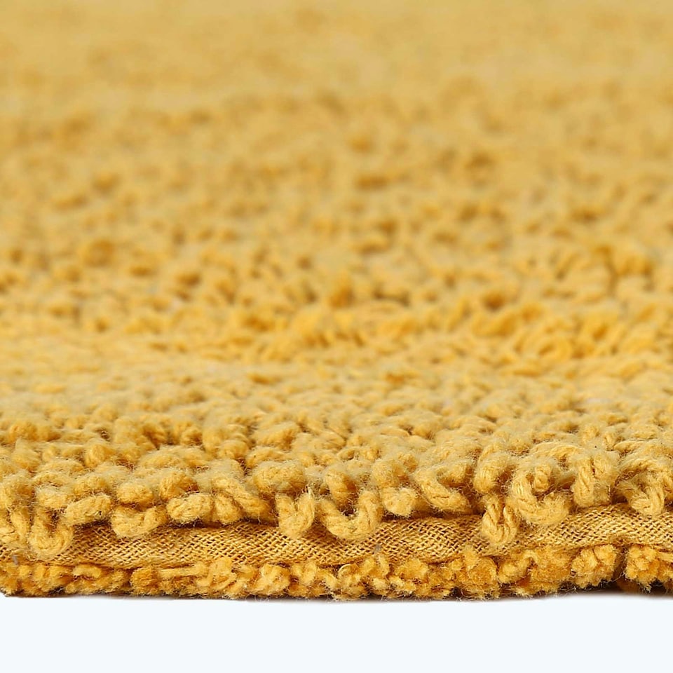 image 1 of Homescapes Luxury Reversible Extra Large Bath Mat - Mustard Yellow Yellow