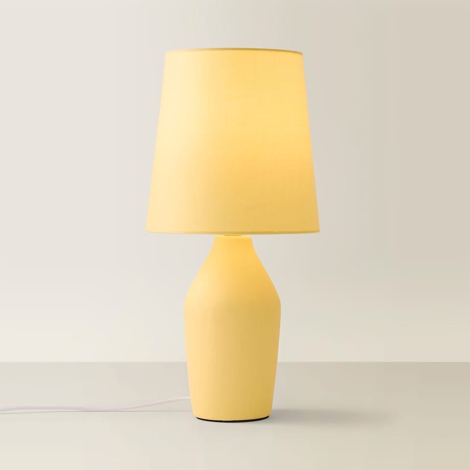 image 1 of ValueLights Arlo Sunshine Yellow Ceramic Table Lamp with Yellow Shade