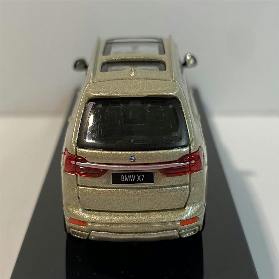 image 1 of BMW X7 Sunstone 1:64 Scale Paragon 65196R