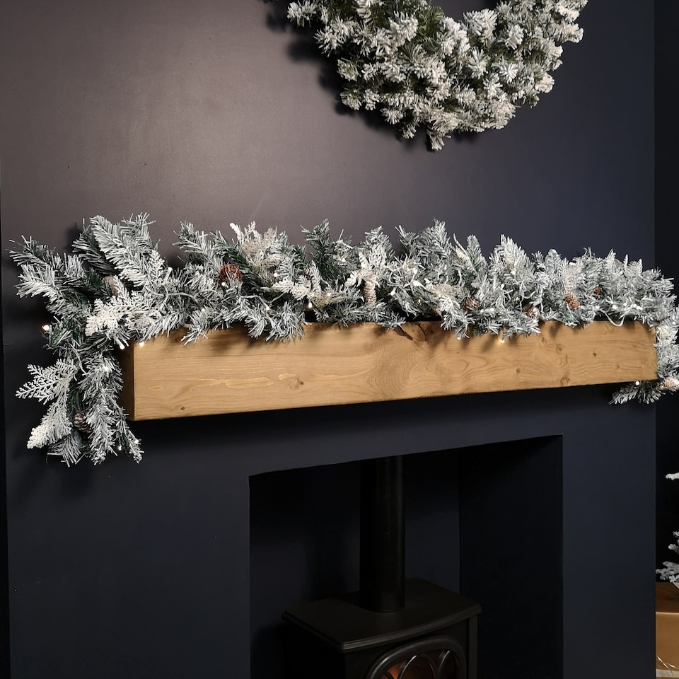 image 1 of 1.8m Snowy Christmas Garland with Pinecones 96 Tips and 50 Warm White LED Lights