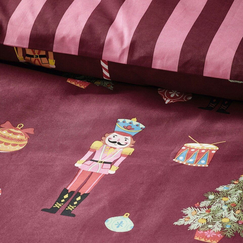 image 1 of Catherine Lansfield Christmas Nutcracker Stripe Reversible Duvet Cover Set Plum | Purple | Plum | Single