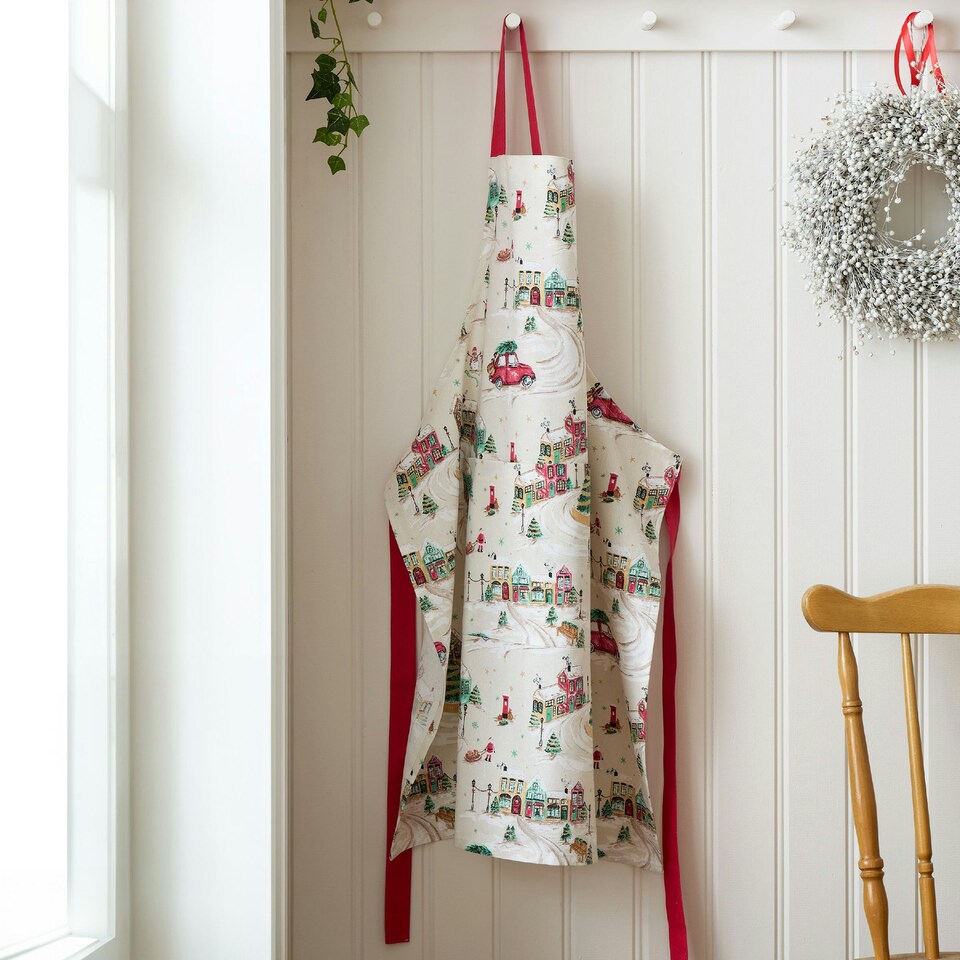 image 1 of Catherine Lansfield Christmas Town Cotton Kitchen Adult Apron Natural Cream | Natural