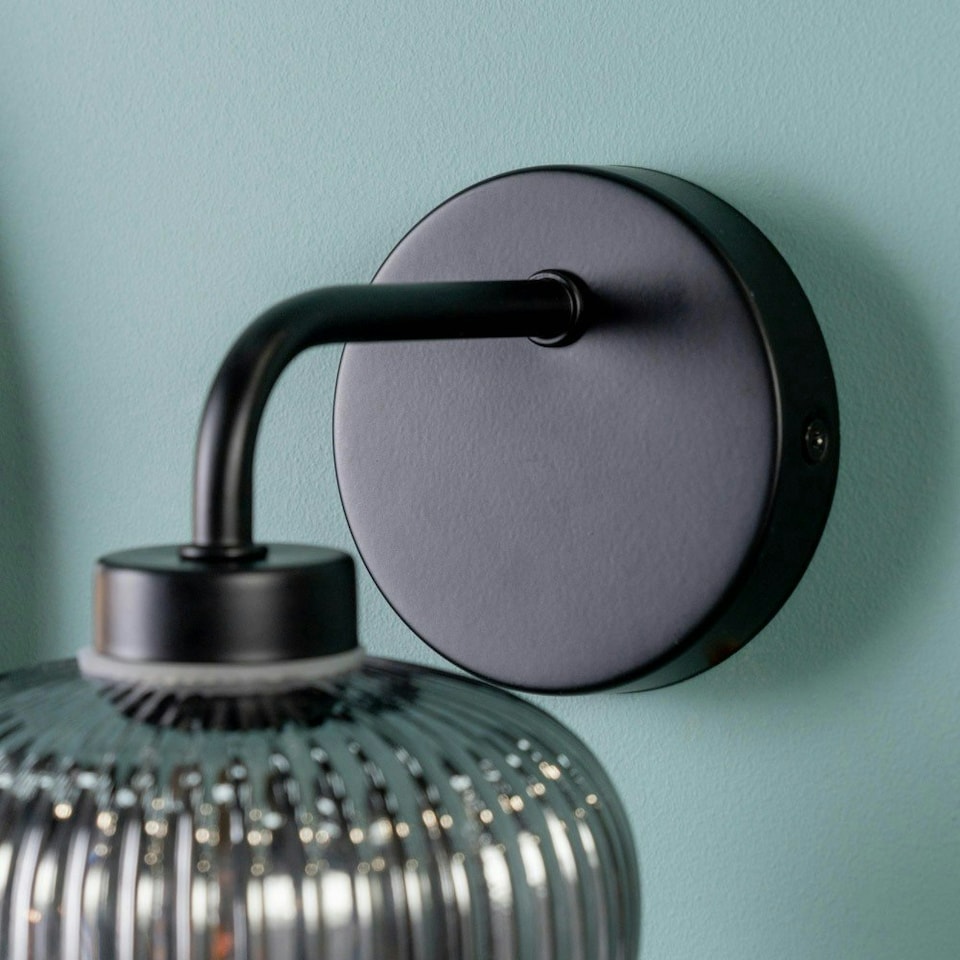 image 1 of ValueLights Amaia Matte Black IP44 Rated Single Smoked Ribbed Glass Wall Light