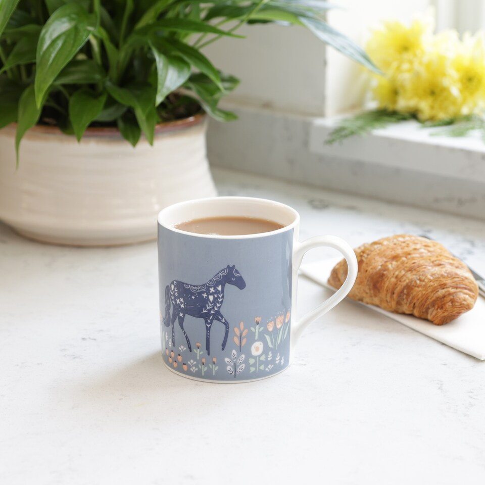image 1 of KitchenCraft Fine Bone China Woodcut Horse 250ml Can Mug | Blue