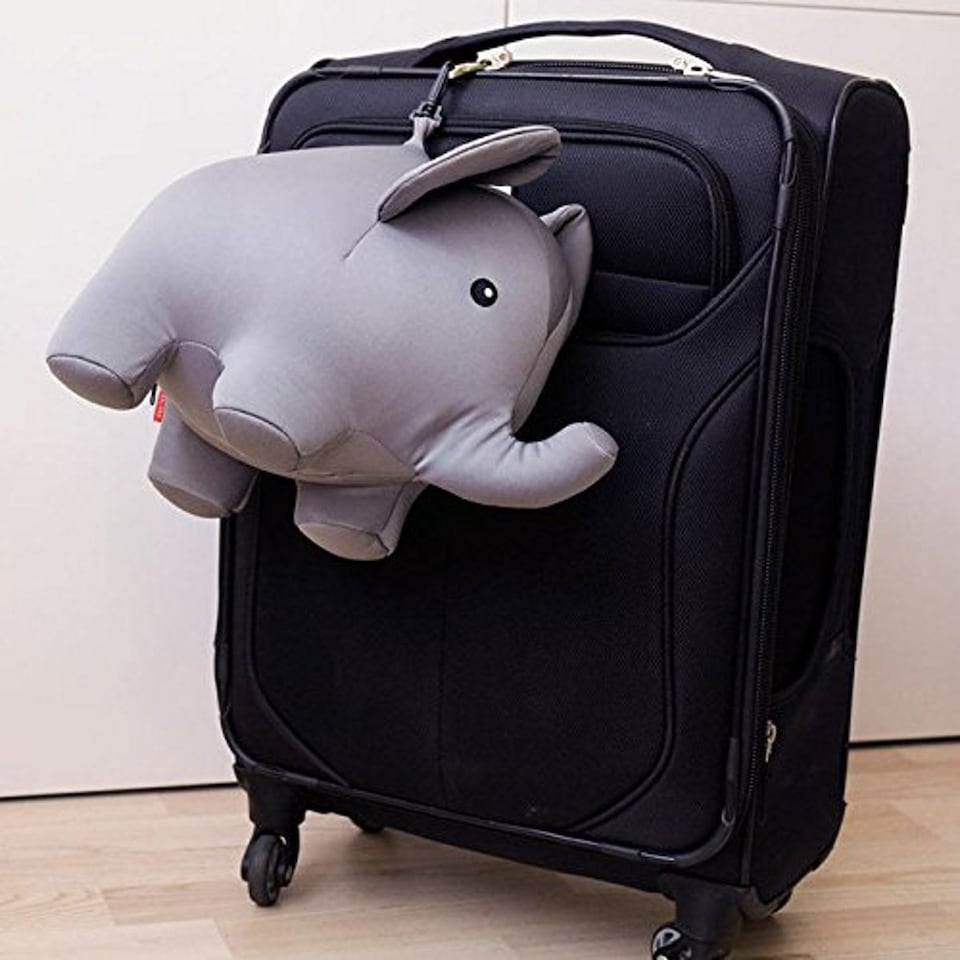 image 1 of Kikkerland Zip & Flip Stuffed Elephant Travel Pillow