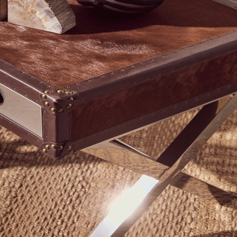 image 1 of Interiors By Premier Brown And White Genuine Cowhide One Drawer Table,Storage Table With Metal Crossed Legs,Small End Table Brown