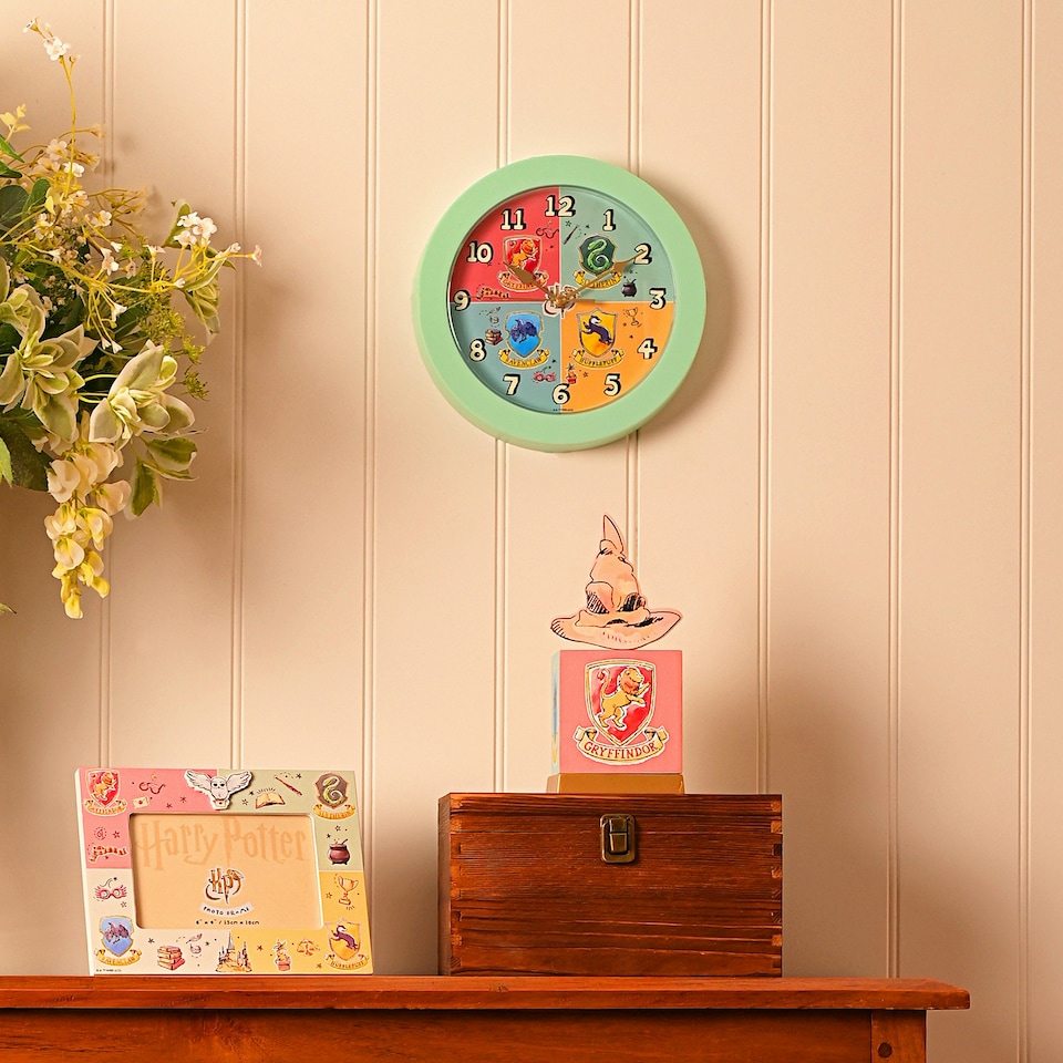 image 1 of Harry Potter Charms Wall Clock - House Crests N/A | Turquoise