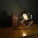 image 1 of ValueLights Modern Smoked Effect Glass Globe Bedside Table Lamp on a Wooden Frame Base