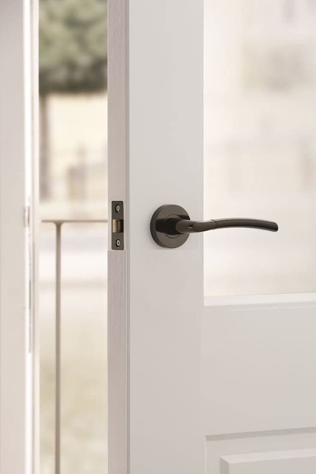 image 1 of Golden Grace Indiana Style Modern Door Handles on Round Rose in Polished Black Nickel Finish with Ball Bearing Hinges & 64mm Tubular Latch | Black | 1 Set