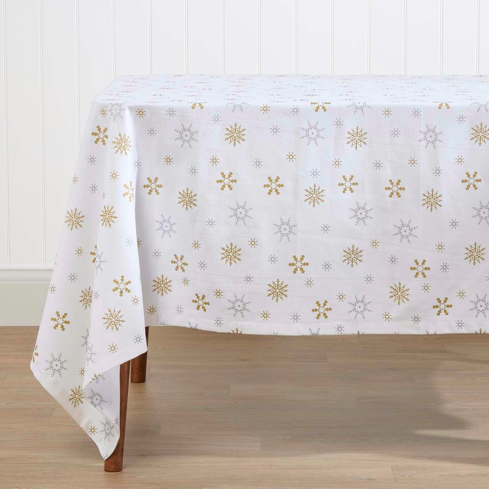 image 1 of Homescapes Gold Snowflake Christmas Tablecloth - 137 x 137 cm | White | 137cm x 137cm (54" x 54")