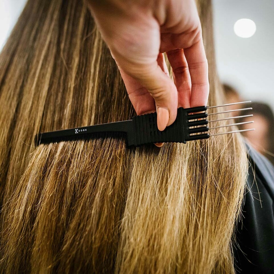 image 1 of Kobe Carbon Metal Prong Comb