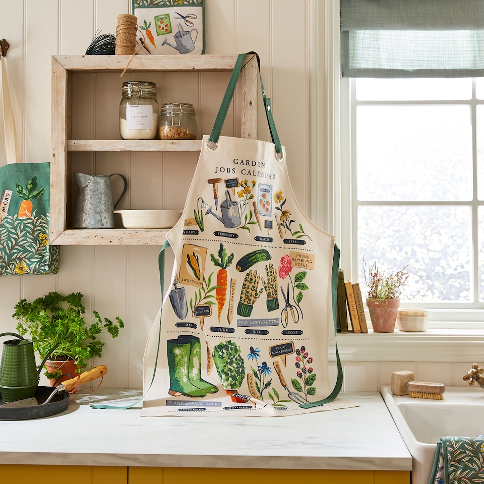 image 1 of Ulster Weavers Time to Grow Apron - PVC/Oilcloth Green