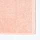 image 4 of Homescapes Imperial Plain Cotton Bath Mat - Peach | Orange | 50 x 80 cm