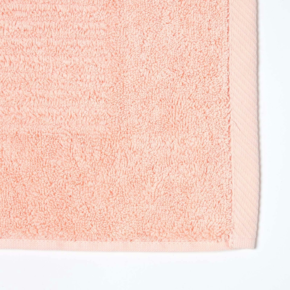 image 1 of Homescapes Imperial Plain Cotton Bath Mat - Peach | Orange | 50 x 80 cm