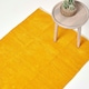 image 1 of Homescapes Mustard Cotton Plain Chenille Rug with Natural Trim - 90 x 150 cm | Yellow | Mustard