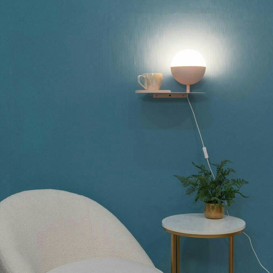 image 1 of ValueLights Marlow Blush Pink Metal Plug in Wall Light with Shelf and Glass Globe Lampshade - Bulb Included