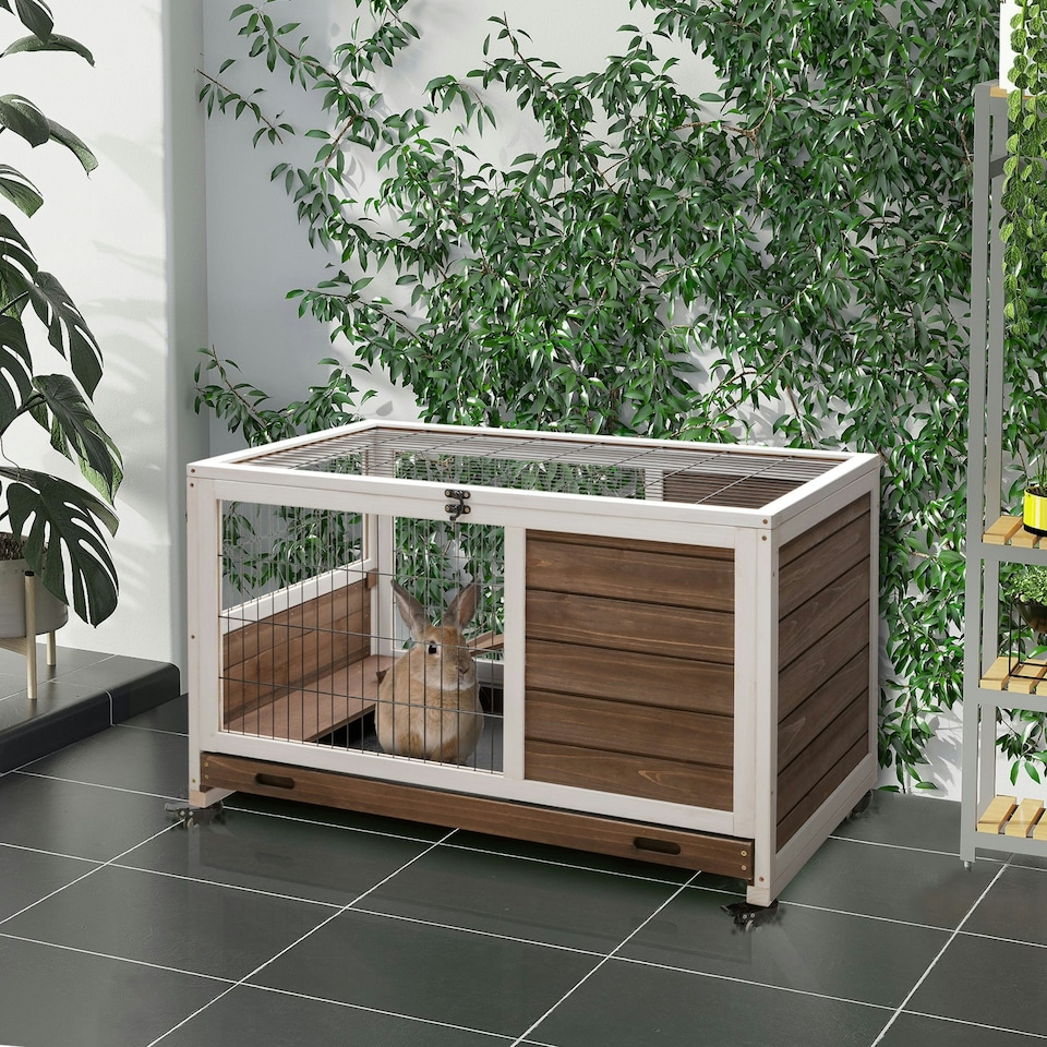 image 1 of PawHut Rabbit Cages, Guinea Pig Hutch w/ Roof & Wheels, No-Leak Tray, Brown