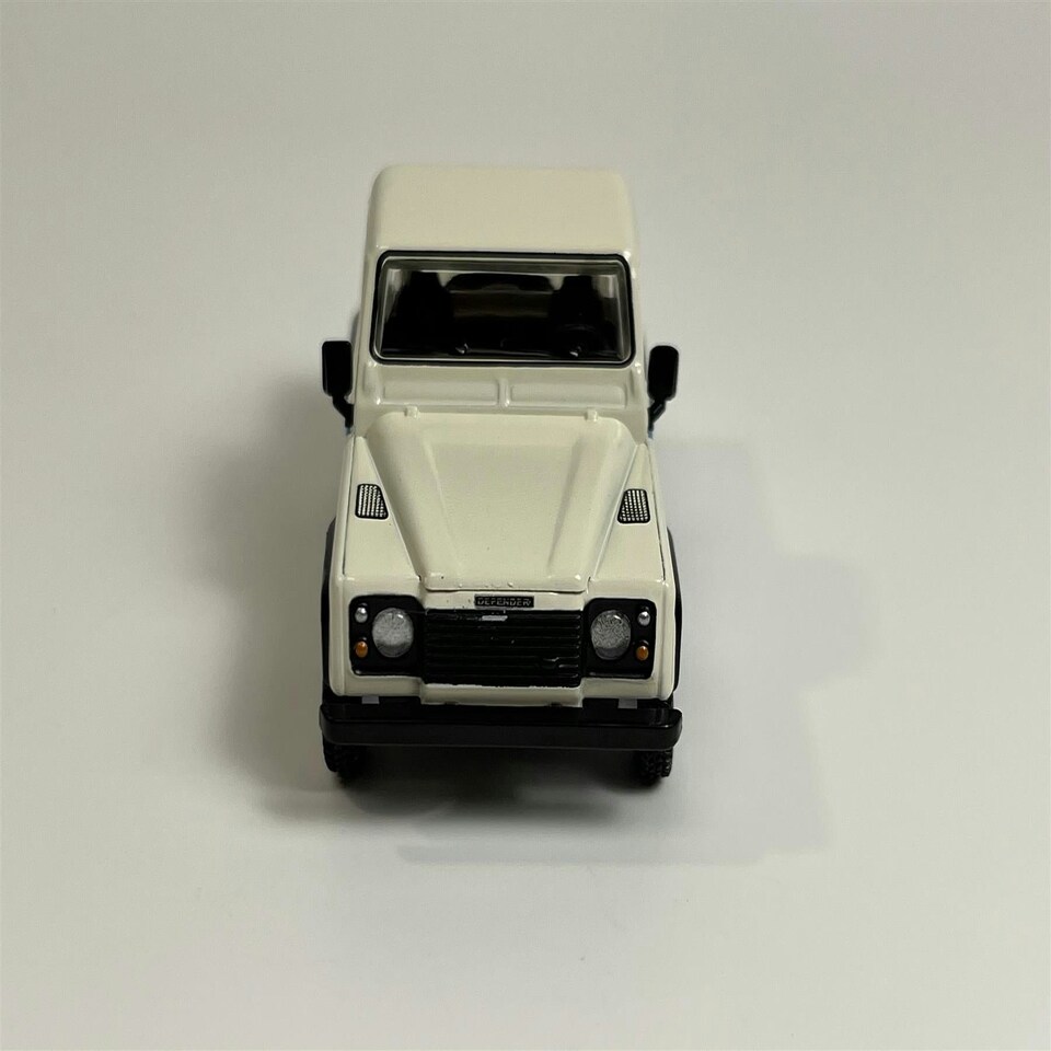 image 1 of Land Rover Defender 90 Pick Up White 1:64 Scale Mini GT MGT00338L