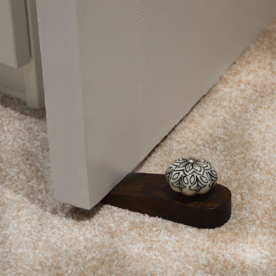 image 1 of Nicola Spring Wooden Door Stop - Black Flower
