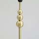 image 1 of ValueLights Marissa Black Fabric Drum Shade with Brushed Gold Stacked Ball Floor Lamp