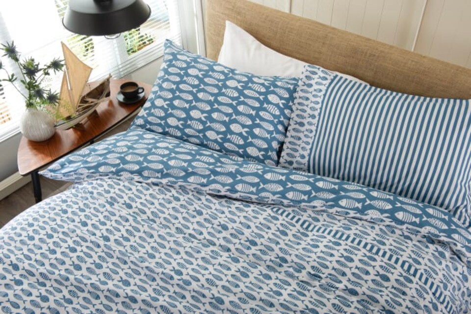image 1 of Small Fish Cotton Duvet Set with Stripe Reverse & Printed Fabric Bag | Multi | Blue