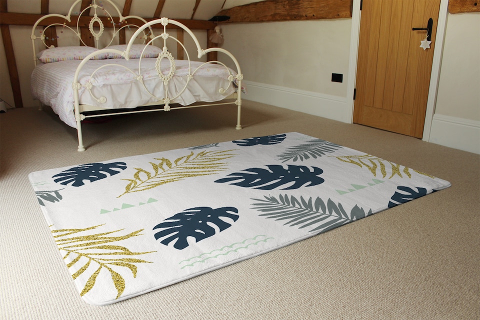 image 1 of Gold Glitter & Navy Leaves Rug | Multi