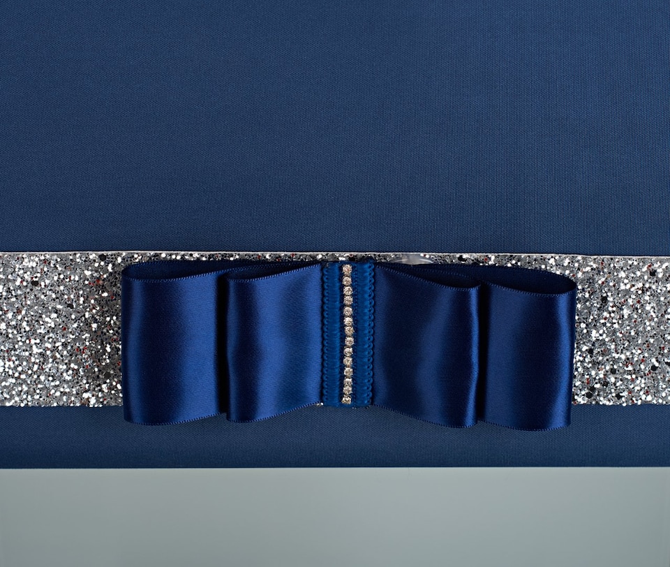 image 1 of FURNISHED Blackout Roller Blind with Silver Glitter Trim and Navy Bow Cut to Size | Blue | Navy | (W) 120cm x (L) 210cm