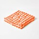image 1 of Homescapes Orange Block Check Cotton Gingham Floor Cushion - 50 x 50 cm | Orange | 50 x 50 cm