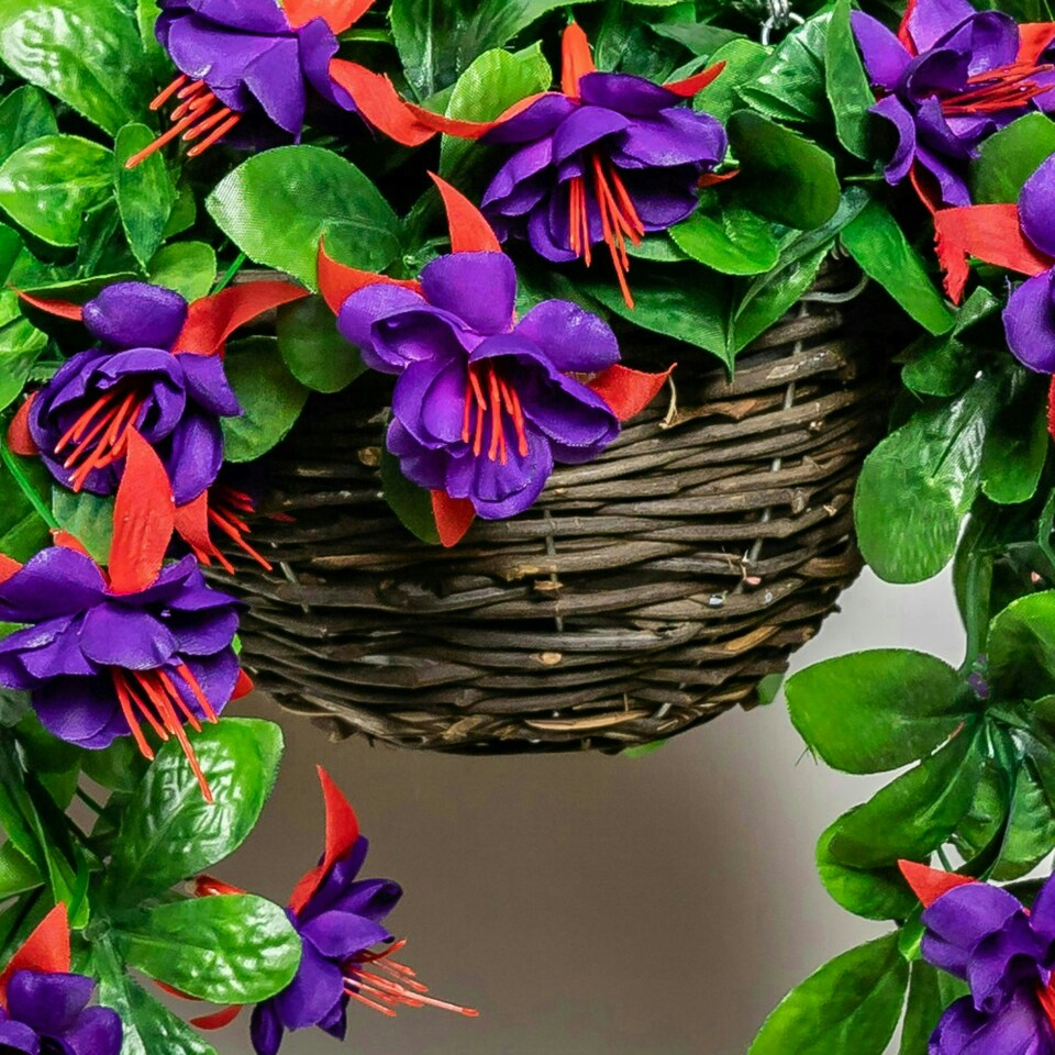 image 1 of Primrose Artificial Fuchsia Flowers with Rattan Hanging Basket in Purple 25cm