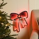 image 1 of 32cm Light up Hanging Bow Infinity Christmas Decoration with Red LEDs