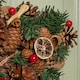 image 6 of 45cm Winter Spice Star Hanging Christmas Wreath with Pine Cones Red Berries & Dried Fruit
