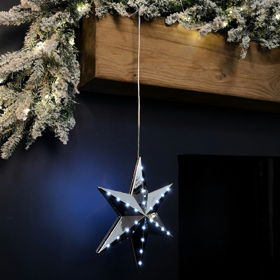 image 1 of 20cm Battery Operated Light up Hanging Christmas Shooting Star Bauble  in Silver with LEDs