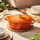 image 2 of Cooks Professional Cast Iron Casserole Dish 28cm - Ovenproof Pan with Lid | Orange | Orange